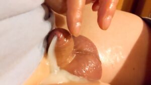 I slowly beating my oil, small, sensitive dick until I could take it anymore